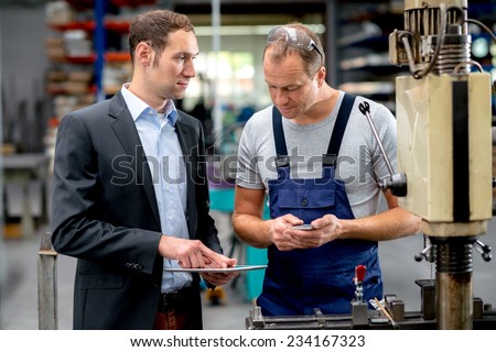 young boss and worker in conversation