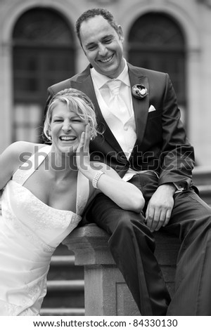 happy bridal couple in black and white