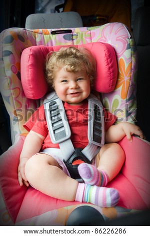 baby in a child car seat