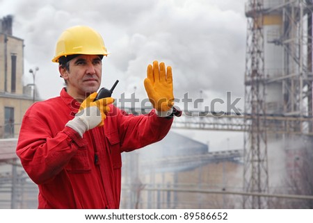 Industrial Worker, controls work in a factory