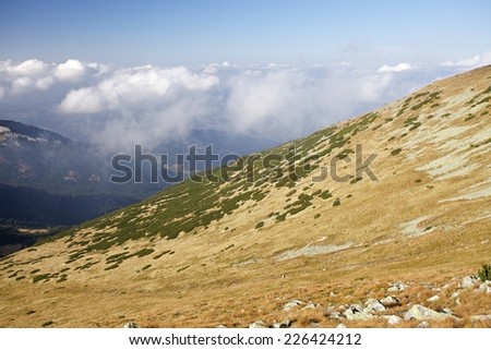 Scrambler on the top of mountain. High Tatra Mountains.