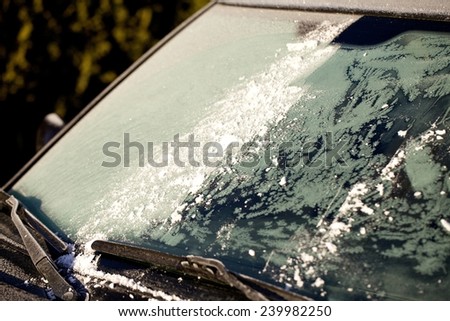Winter windshield wipers for cars. Transportation, winter, weather and vehicle concept