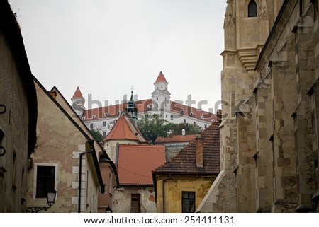 Street of Bratislava old town. Bratislava castle on top