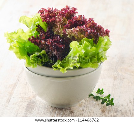 Lettuce salad  on a wooden table