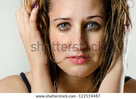 Beautiful woman\'s face with water drops