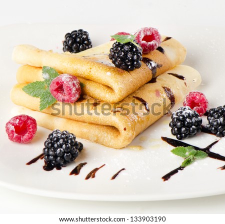 Sweet crepes with berries
