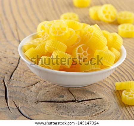 Pasta on a wooden table. Selective focus
