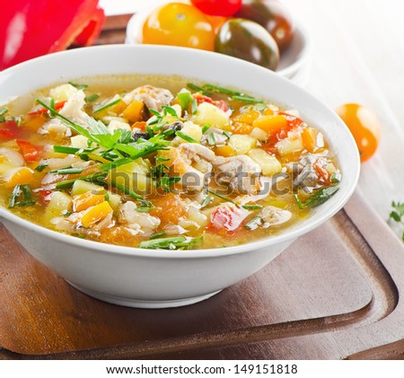 Bowl of vegetable Soup with chicken. Selective focus