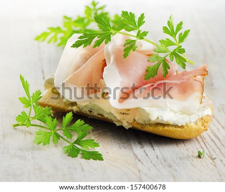 Bread with smoked bacon and cream cheese. Selective focus