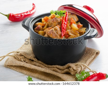 Vegetable and meat stew with chili peppers.Selective focus