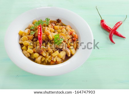 Vegetable and meat stew with chili peppers.Selective focus