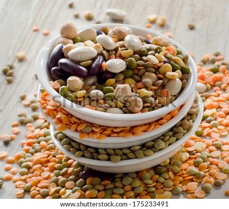 Beans and lentil on a wooden table . selective focus