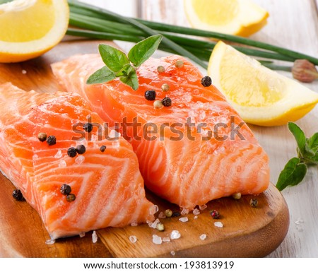 Salmon on a wooden board Selective focus Salmon on a wooden board Selective focus