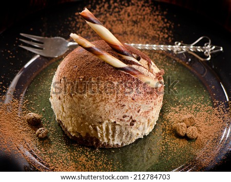 Sweet handmade chocolate cake on a plate. Selective focus