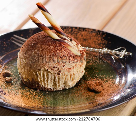 Sweet handmade chocolate cake on a plate. Selective focus