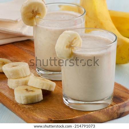 Two glasses of Banana smoothie . Selective focus