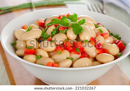 White beans salad  in   a  bowl. Closeup. Selective focus