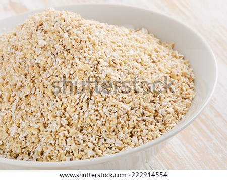 Healthy Oat bran on   wooden table. Selective focus