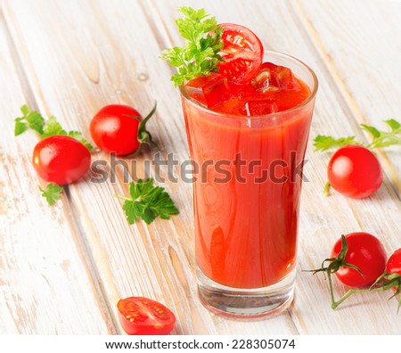 Tomato Cocktail  on  wooden background. Selective focus