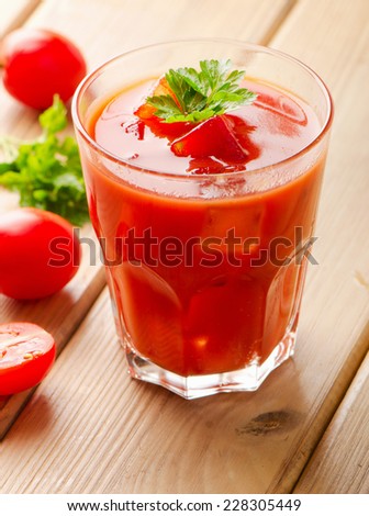 Tomato Cocktail  with   herbs and ice. Selective focus