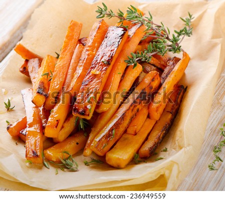 sweet potato fries with  herbs . Selective focus