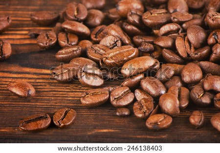 Coffee beans  on  old  background. Selective focus
