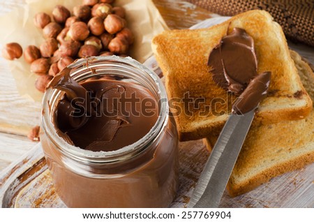 Fresh Toast bread , nuts and  chocolate spread .