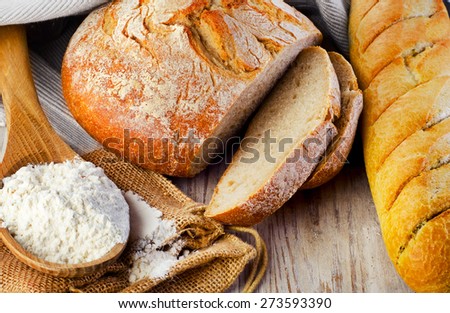 Fresh Bread on a wooden table. Selective focus