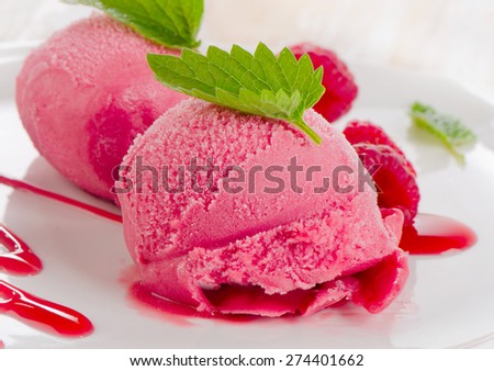 Raspberry sorbet with fresh mint. Selective focus