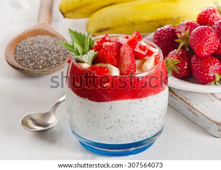 Healthy eating. Breakfast of strawberries,banana, yogurt and chia seeds. Selective focus