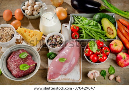 Assortment of Fresh Vegetables and Meats for Healthy Diet on a rustic table. Top view