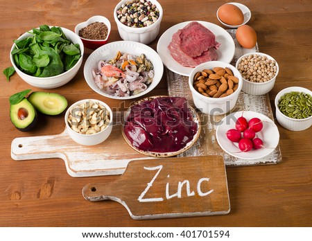 Foods with Zinc mineral on a wooden table. Top view