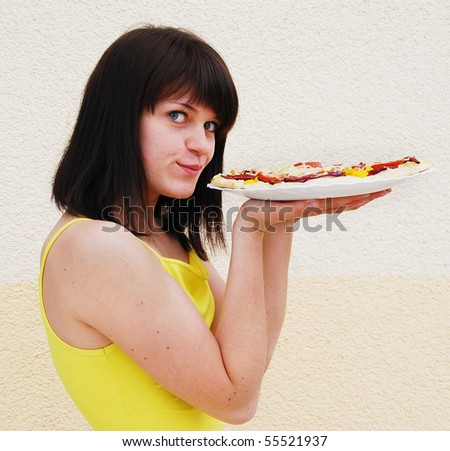 Young woman with pizza