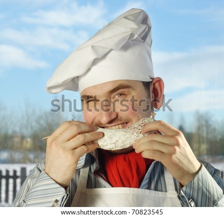 Young man in chef hat