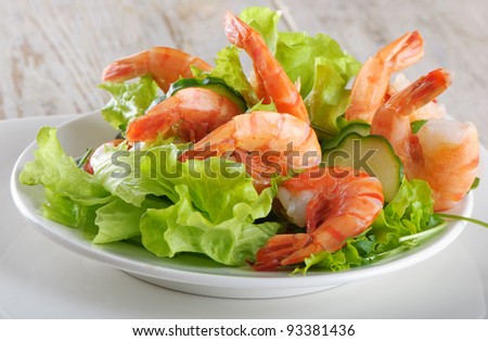 Green salad with shrimps - stock photo