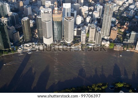 Brisbane Flood 2011 Aerial View CBD Restaurants and Ferry Terminals Under Water. Restaurants, ferry terminals and board walks vanished from view as parts of the inner city were consumed by flooding.
