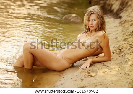 Wet amazing woman in bikini