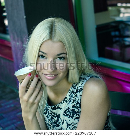 beautiful young girl resting in a cafe