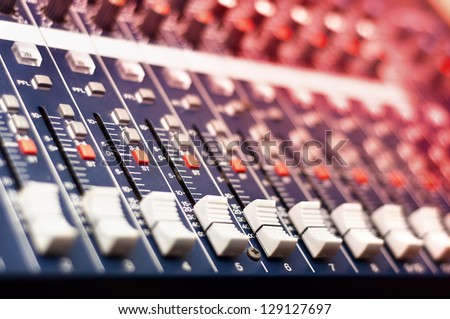 Close-up of music mixer in audio studio