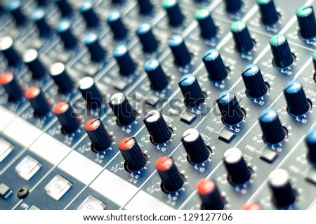 Detail of a music mixer in studio
