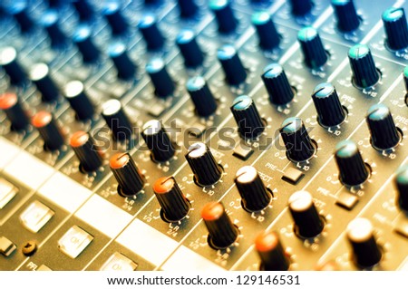 close-up of music mixer in nightclub