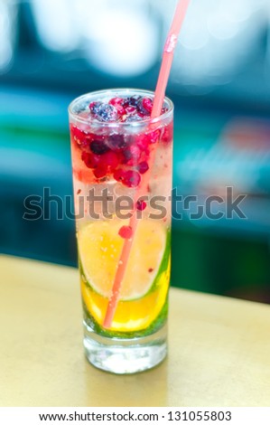 Fresh Lime Lemonade with blueberries and redcurrants. Freshness and health concept