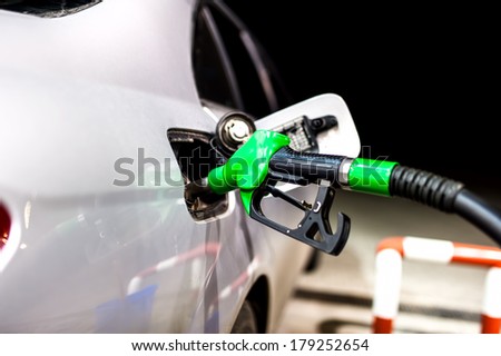Petrol pump filling.Refuel from gas station with modern nozzle