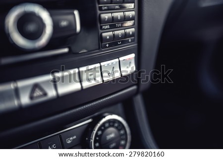 Modern car dashboard with seat ventilation and heating system. Modern details of electric car