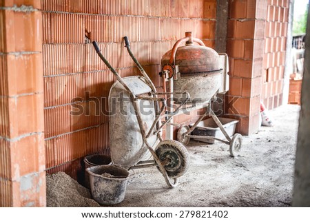 Cement mixer machine, wheel barrow and other construction site tools after working hours