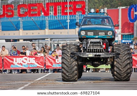 CLUJ-NAPOCA, ROMANIA - SEPTEMBER 26: Monster truck show during the Ursus alcohol free truck competition, September 26, 2009, Cluj-Napoca, Romania