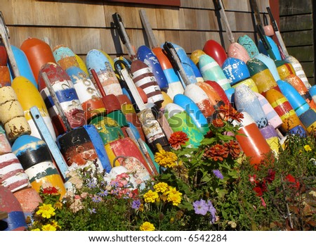 Decorative buoys by the side of a beach house
