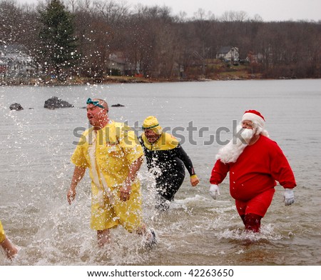 COVENTRY, CT - DECEMBER 5: Brave volunteers jump in the lake at a \