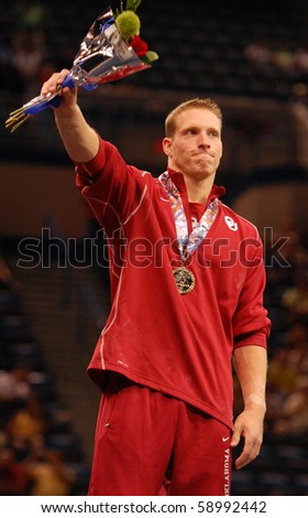 HARTFORD; CT - AUGUST 13: Gymnast  Steven Legendre wins a gold medal on the vault event at the men\'s competition at the VISA Gymnastics Championships on August 13, 2010 in Hartford, CT.