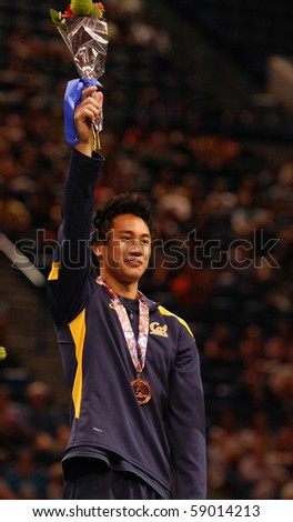 HARTFORD; CT - AUGUST 13: Gymnast Glen Ishino wins a bronze medal on the Pommel Horse event at the men\'s competition at the VISA Gymnastics Championships on August 13, 2010 in Hartford; CT